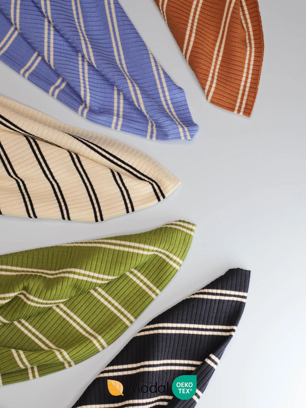Assorted Derby stripe jersey fabrics in various colors displayed on a white background.