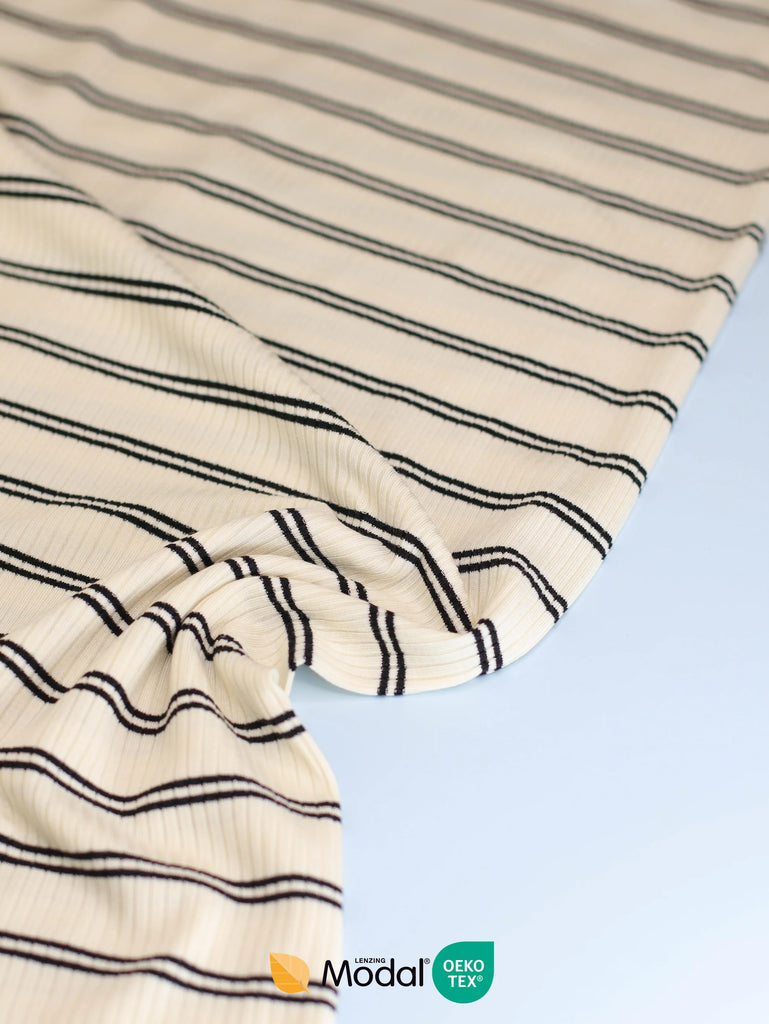 cream and black stripe jersey fabric