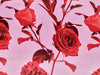 Red roses on a pink background