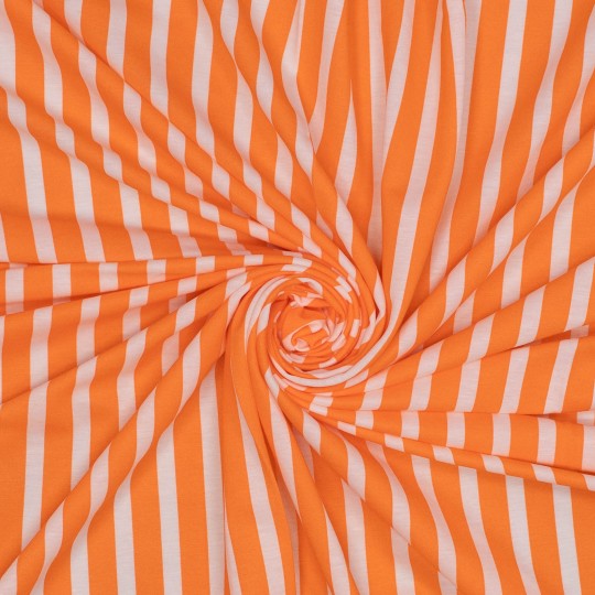 Close-up of orange and white striped fabric in a swirl pattern