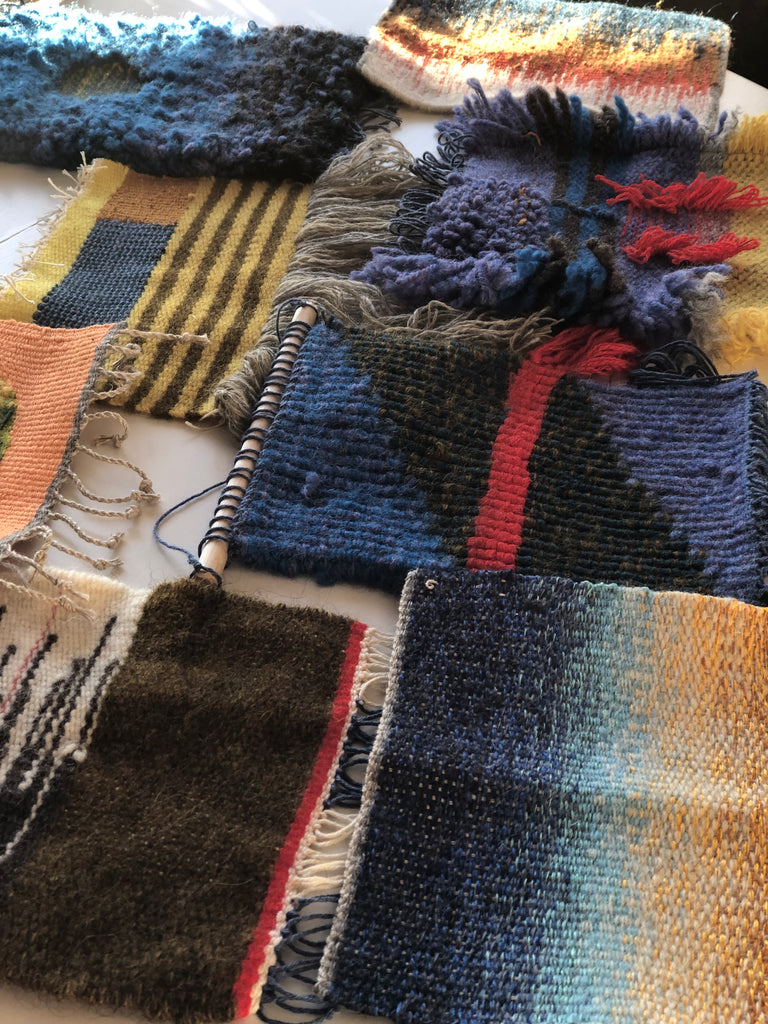 Collection of woven fabric samples with various patterns and colors.