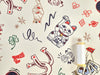 Patterned fabric with lucky cat, horseshoe, and other symbols on a beige background