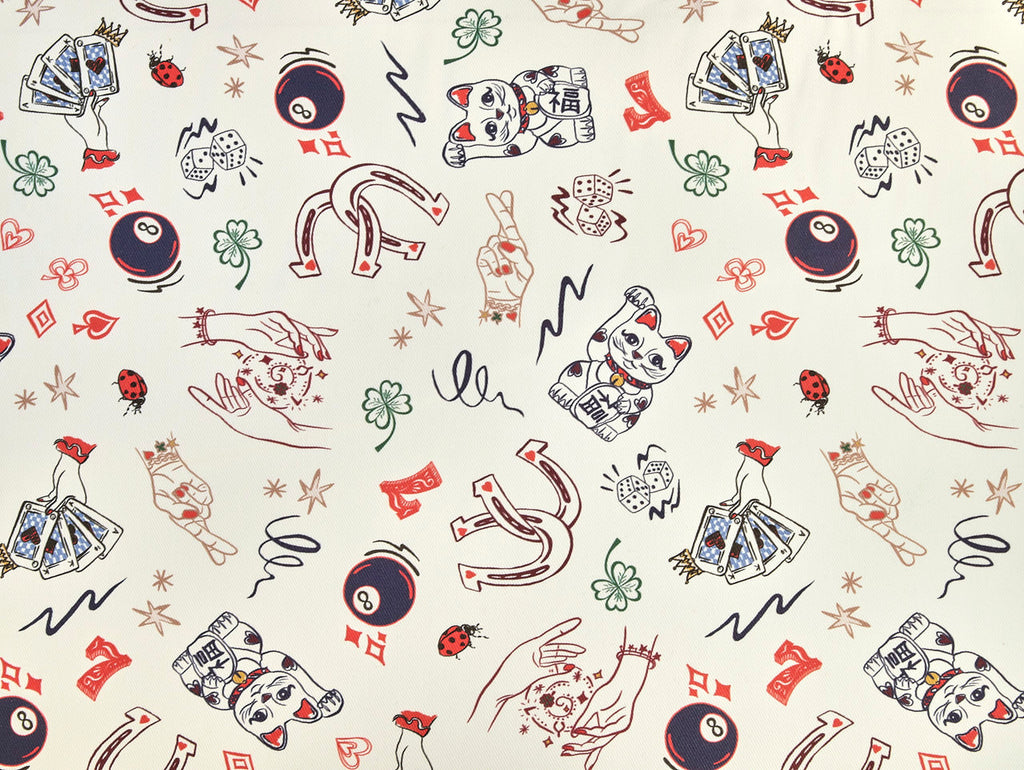 Patterned design with various symbols on a light background
