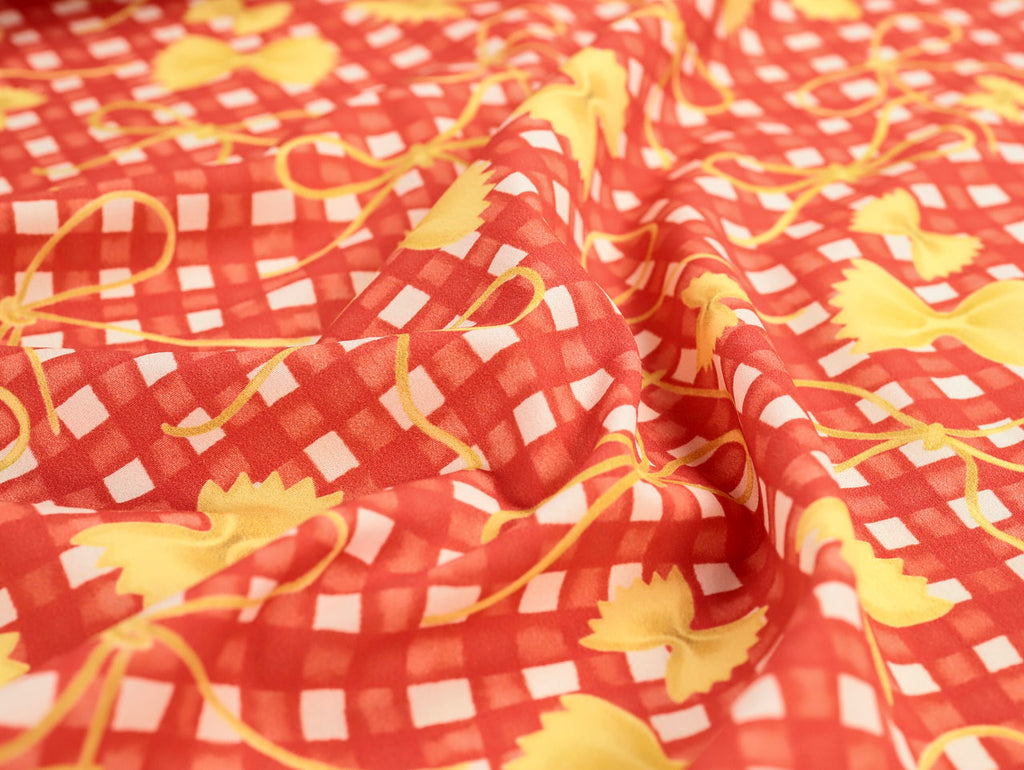Red fabric with yellow and white pattern