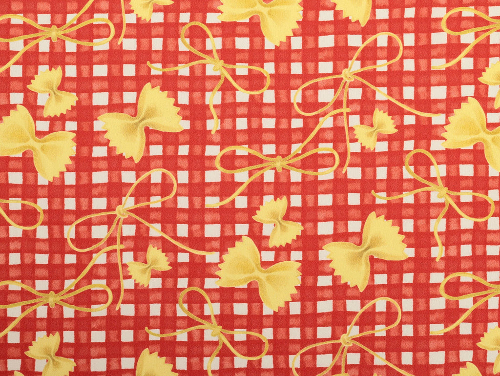 Red and white checkered fabric with yellow bow patterns