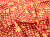 Red fabric with yellow checkered pattern