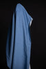 Blue garment on a black background