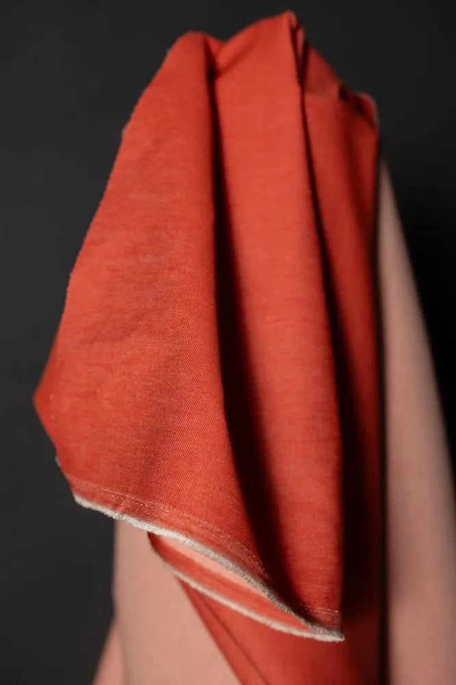 Red fabric with a dark background