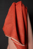 Red fabric with a dark background