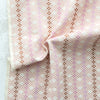 Close-up of pink and brown patterned fabric