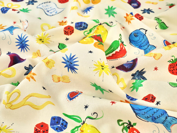 Colorful fabric with various patterns and shapes on a beige background