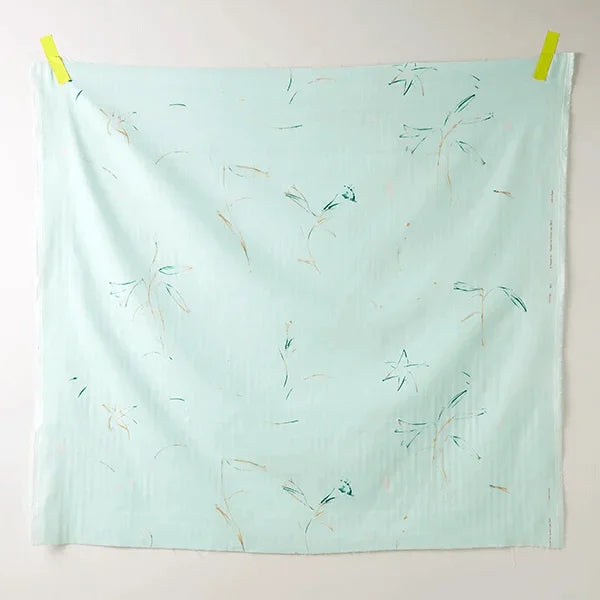 a square of mint cotton fabric