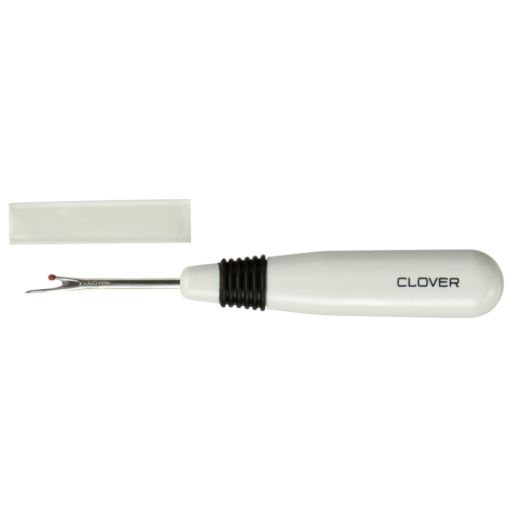 seam ripper on white background