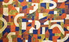 a close up of orange, blue and yellow geometric fabric
