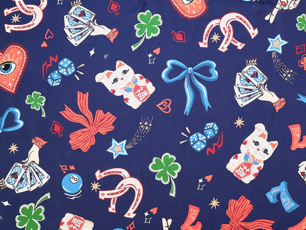 Colorful pattern with lucky charms on a blue background