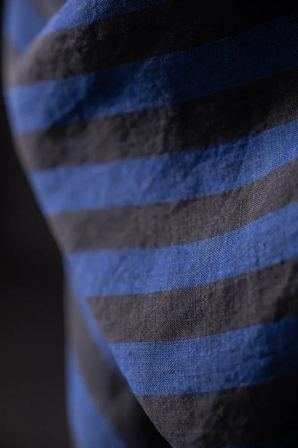 Close-up of a blue and gray striped fabric texture