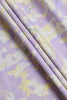 Roll of purple and yellow patterned paper