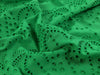 Green lace fabric with intricate patterns