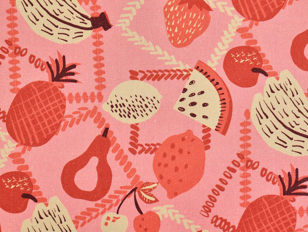 Fruit pattern with pears, bananas, and apples on a pink background