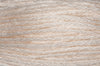 Close-up of beige and white yarn strands