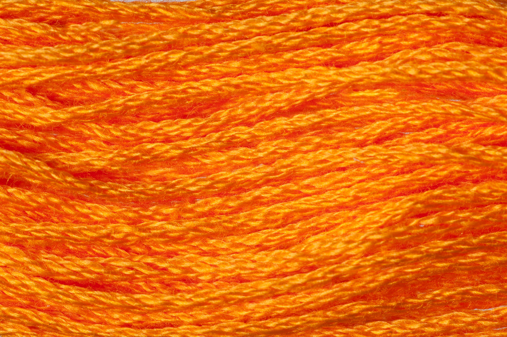 Close-up of bright orange embroidery floss