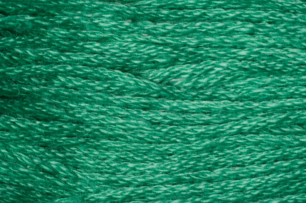 Close-up of green embroidery floss