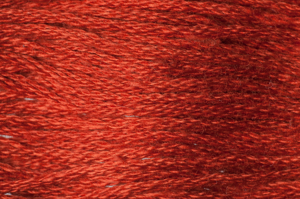 Close-up of red embroidery floss