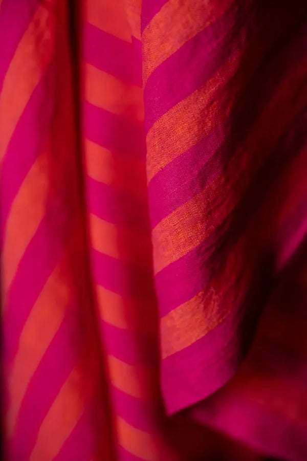 a close-up of pink and orange stripe fabric