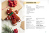 A printed knitting pattern page titled 'Gingerbread Man' showing size, notes, and step-by-step instructions beside a photo of a crocheted gingerbread man on a kraft paper background with holiday decorations.