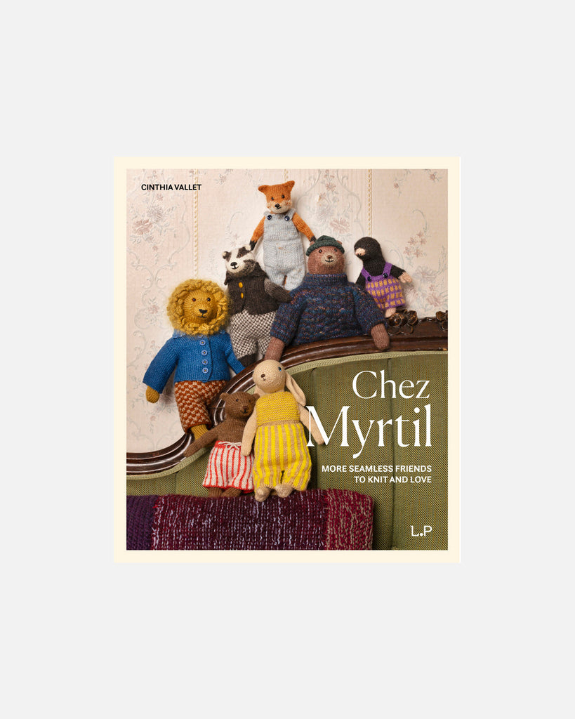 Book cover for 'Chez Myrtil' by Cinthia Vallet, featuring a group of knitted and plush stuffed animals posed on a green sofa against a patterned wallpaper background.