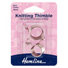 Knitting thimble package with pink background and Hemline branding