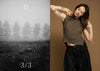 Woman in a textured top and black pants against a brown background, with a foggy landscape on the left.