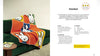 An open book showing a crochet blanket pattern page. The left page features a photo of a colorful crocheted blanket draped over a green chair, with the right page containing the title 'blanket', a star rating, dimensions, stitch count, materials, and instructions.