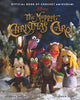 Front cover of the book 'The Muppet Christmas Carol' featuring crocheted Muppet characters standing in a snowy outdoor scene, with the Disney logo and title text at the top.