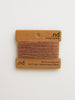Two brown cashmere swatches on a beige card with 'nd' branding on a white background