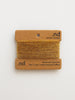 Reclaimed cashmere yarn on a branded card with 'nd' branding on a light background