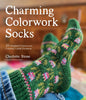 Book cover of 'Charming Colorwork Socks' with a green knitted sock featuring colorwork patterns.