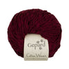 Ball of red yarn with a Gepard label on a white background