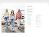 Three women walking on a beach wearing colorful sweaters with a magazine layout showing text on the right.