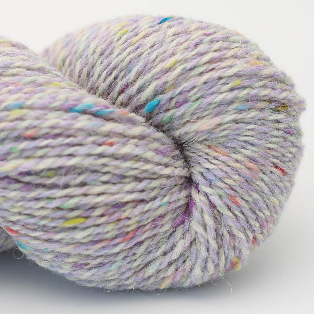 Multicolored yarn skein on a white background