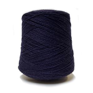 Navy blue skein of yarn on a white background