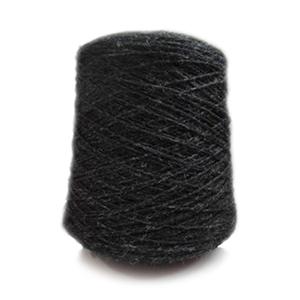 Black yarn cone on a white background