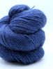 Blue skein of yarn on a white background