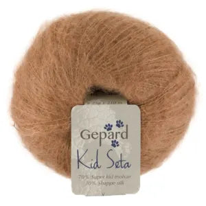 Ball of brown yarn with a 'Gepard Kid Seta' label on a white background