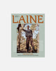 Magazine cover featuring a person in a forest with 'Laine' branding.