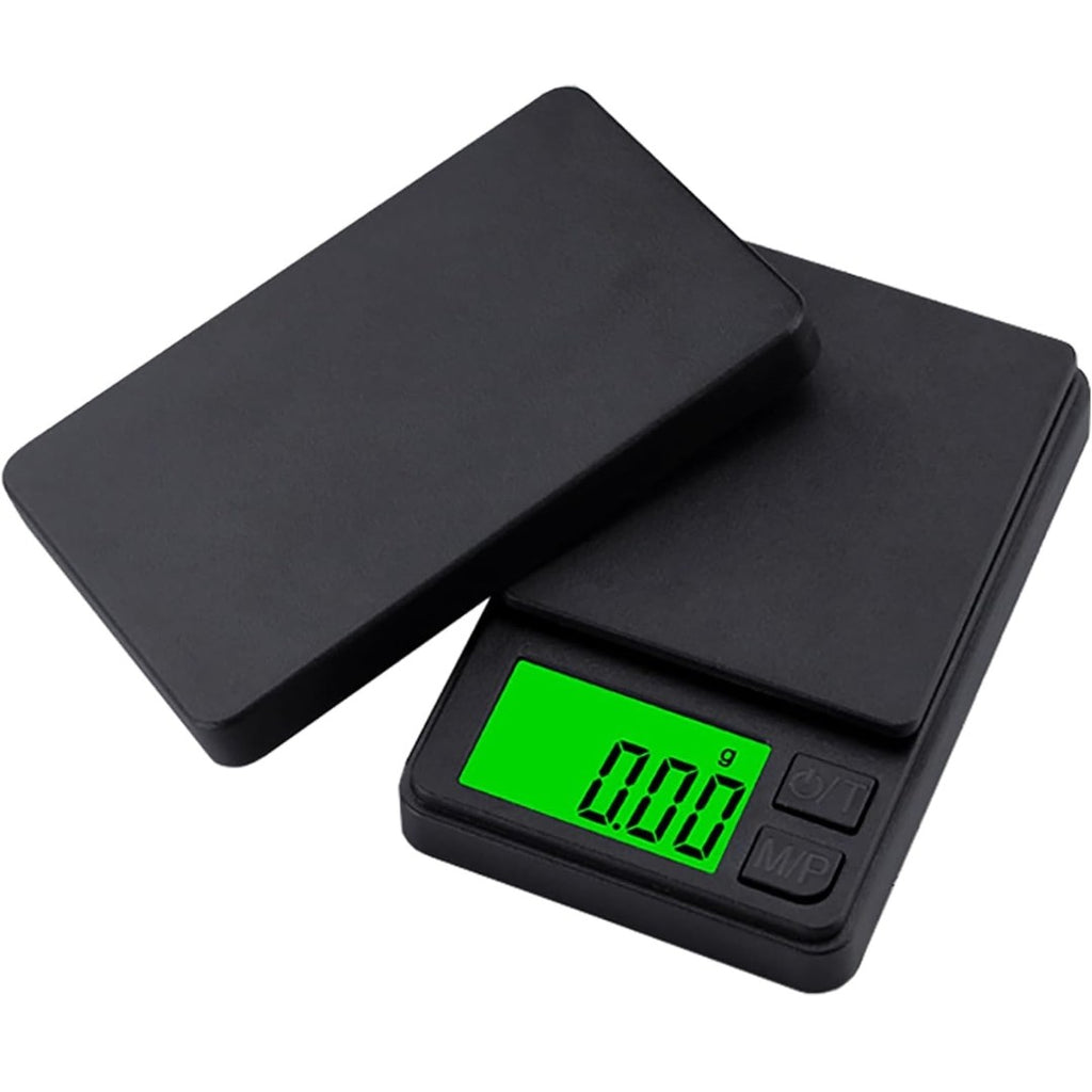 Black digital pocket scale with a green display on a white background