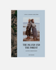 Book cover of 'The Island and The Forest' with a photo of two people on a beach and text.