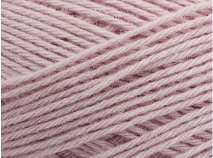 Close-up of pink yarn with a soft texture
