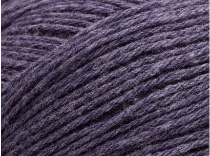 Close-up of dark purple yarn texture