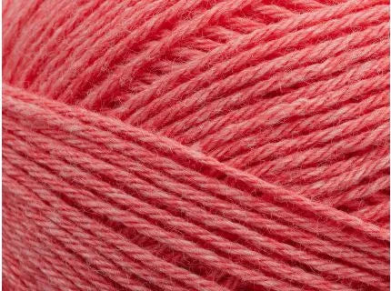 Close-up of pink yarn with a soft texture